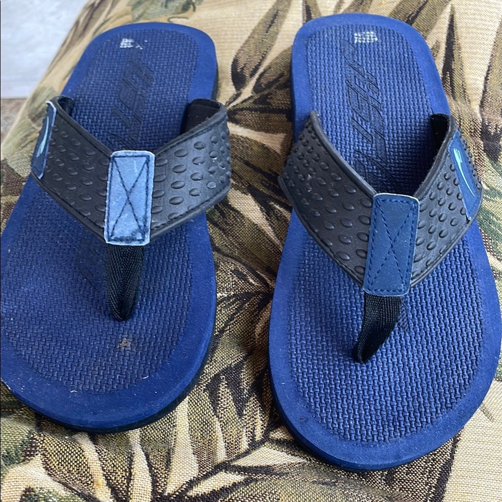 Blue and Black Flip Flops